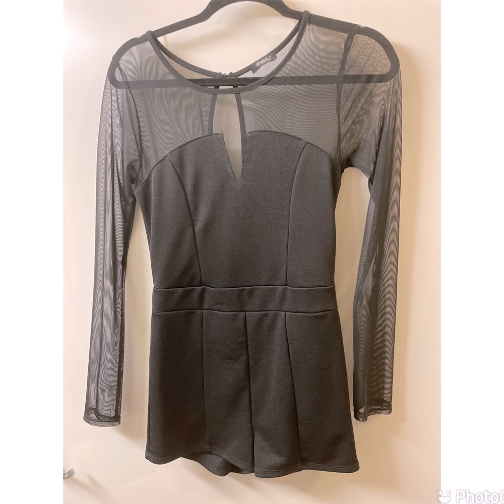 One piece short romper with mesh long sleeves and slight open back.